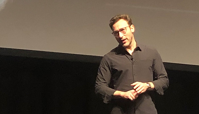 Simon Sinek on stage in London 2019